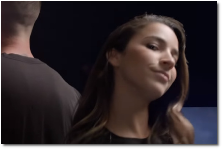 Aly Raisman taunting a vampire with her world-class, Olympic-grade neck in Girls Like You (30 May 2018)